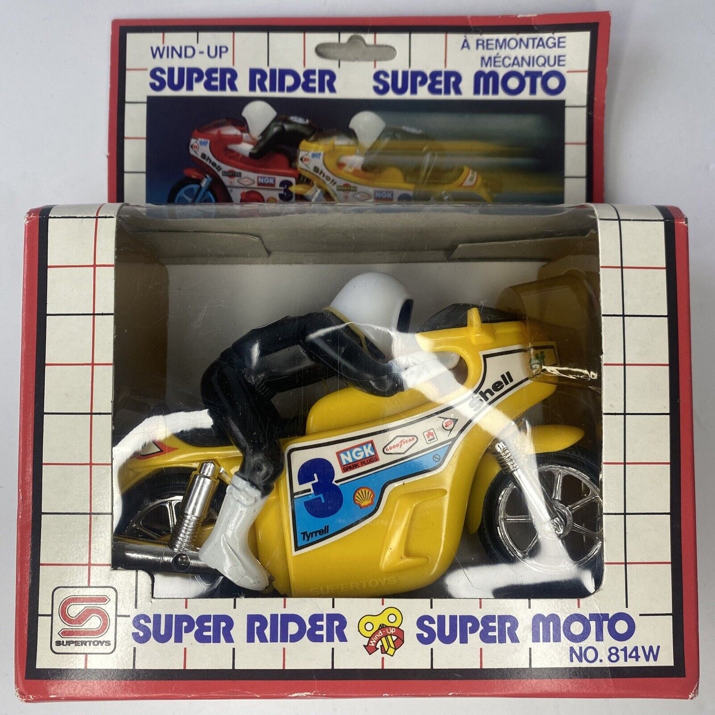Vintage 1982 Super Rider Super Moto Wind Up toy Motorcycle Supertoy’s Yellow.
