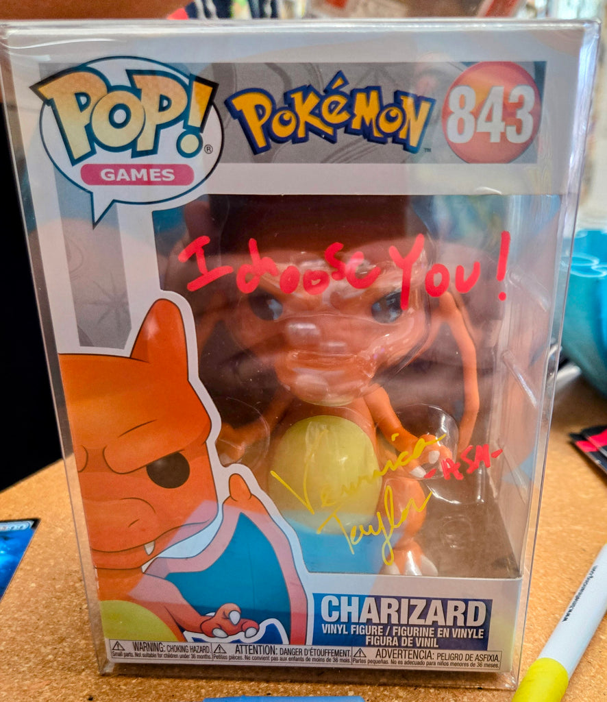 Charizard Funko 843 - signed by Veronica Taylor.