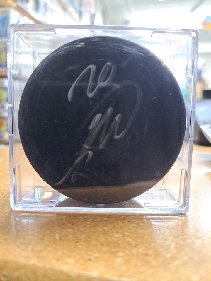 Sebastian Aho Beckett Authenticated Autographed Hockey Puck