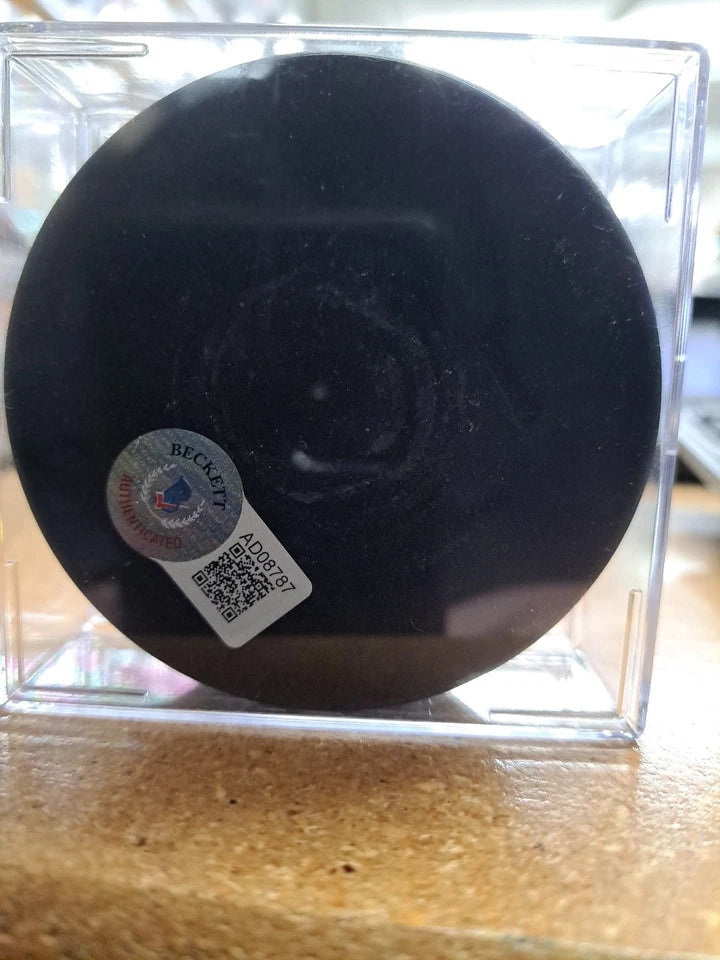 Sebastian Aho Beckett Authenticated Autographed Hockey Puck
