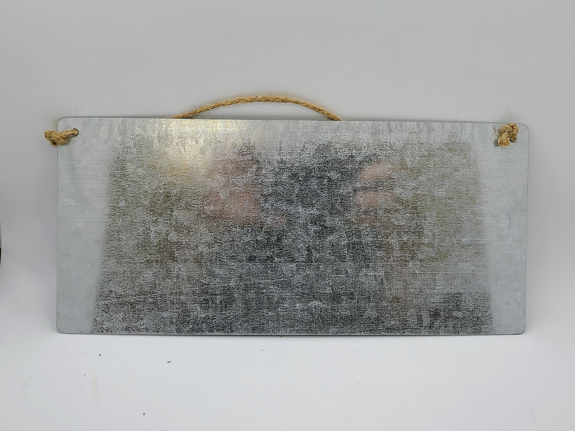 Metal plaque.